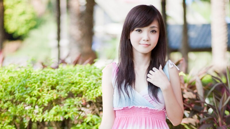woman in pink dress outdoors