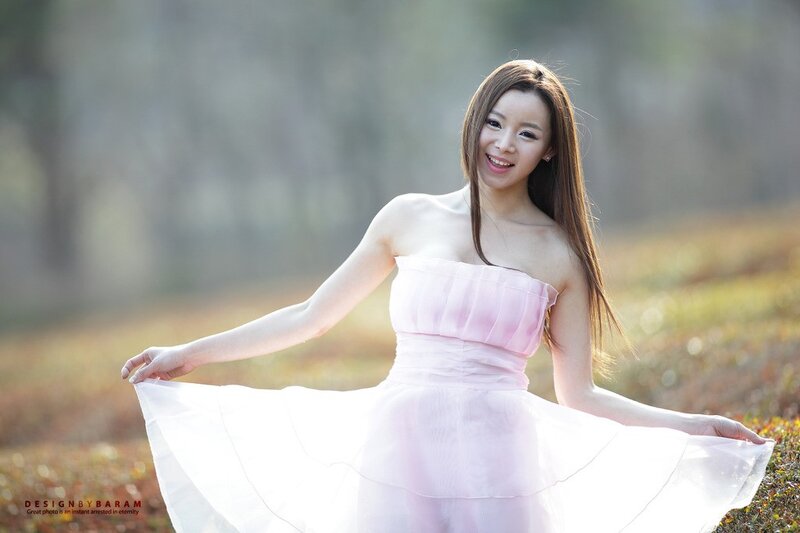 woman in pink dress outdoors