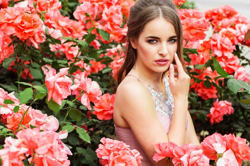 Woman in Pink Dress — Serene, Afternoon, Photograph, Roses, Flowers, Green Leaves