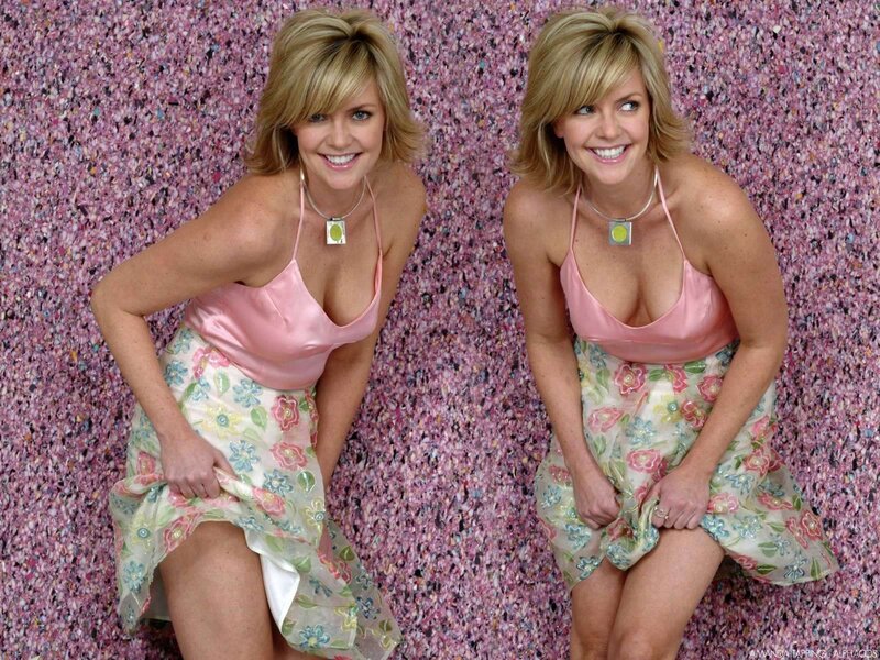 Woman in pink dress smiling