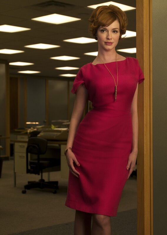 Woman in pink dress standing