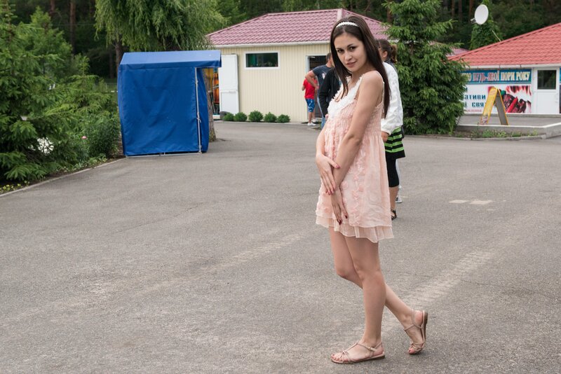 Woman in pink dress walking