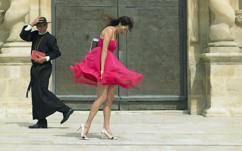 Woman in pink dress walking