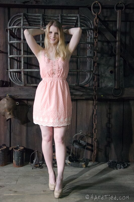 Woman in pink dress with chains