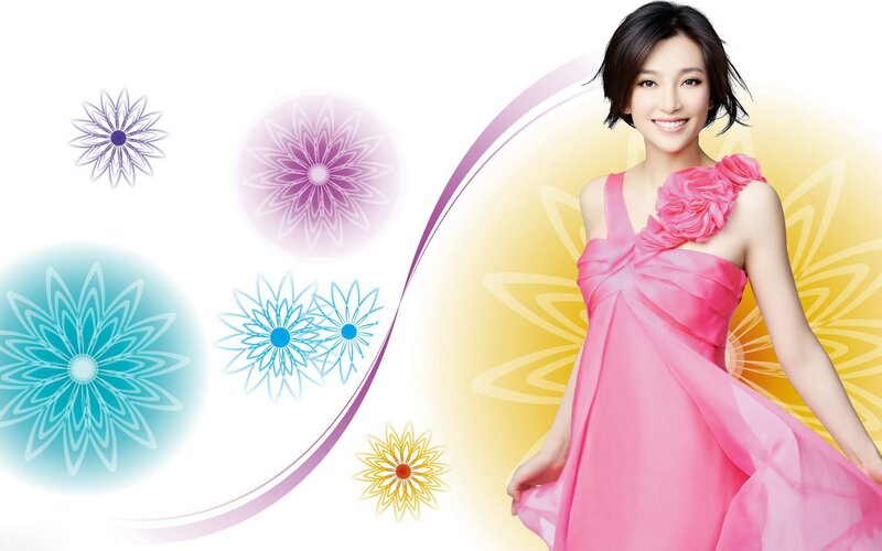 woman in pink dress with floral design