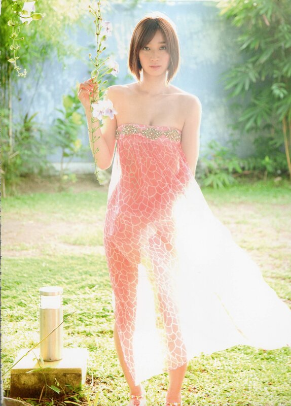 Woman in pink dress with flowers