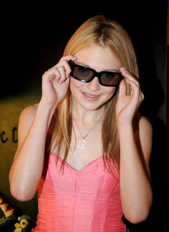 woman in pink dress with sunglasses