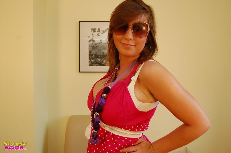 Woman in pink dress with sunglasses