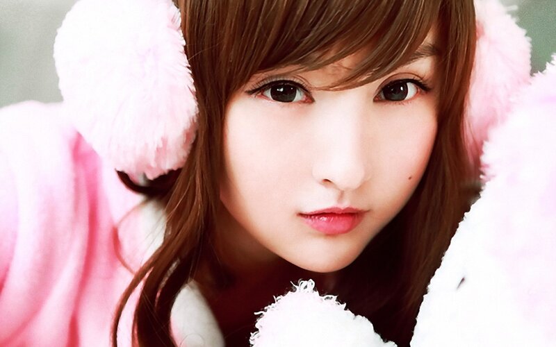 woman in pink earmuffs