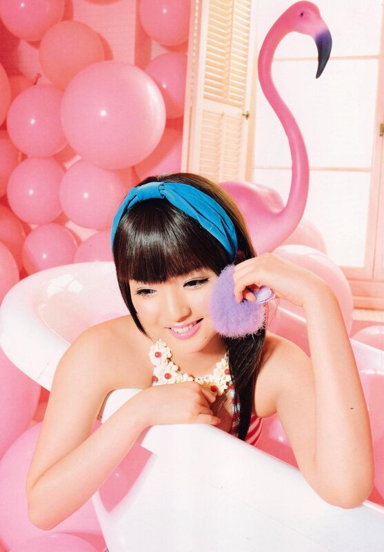 woman in pink flamingo-themed photo