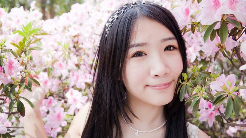 woman in pink flower garden