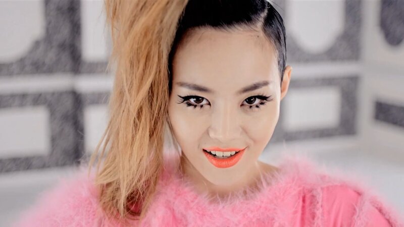 woman in pink fluffy top
