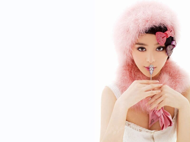 woman in pink fur hat