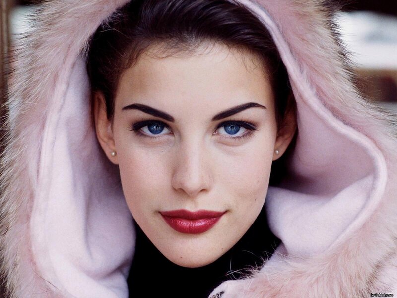 woman in pink fur hood