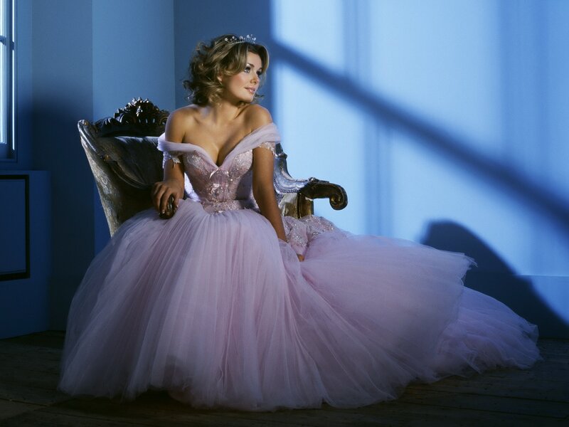 Woman in pink gown on throne