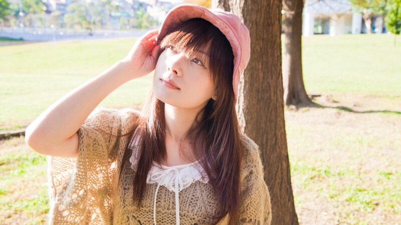 Woman in pink hat outdoors