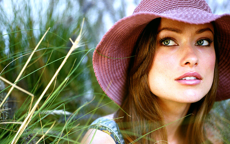 woman in pink hat outdoors