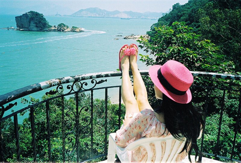 Woman in Pink Hat — Relaxed