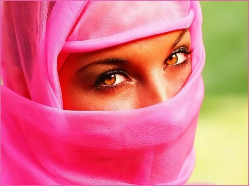 woman in pink headscarf