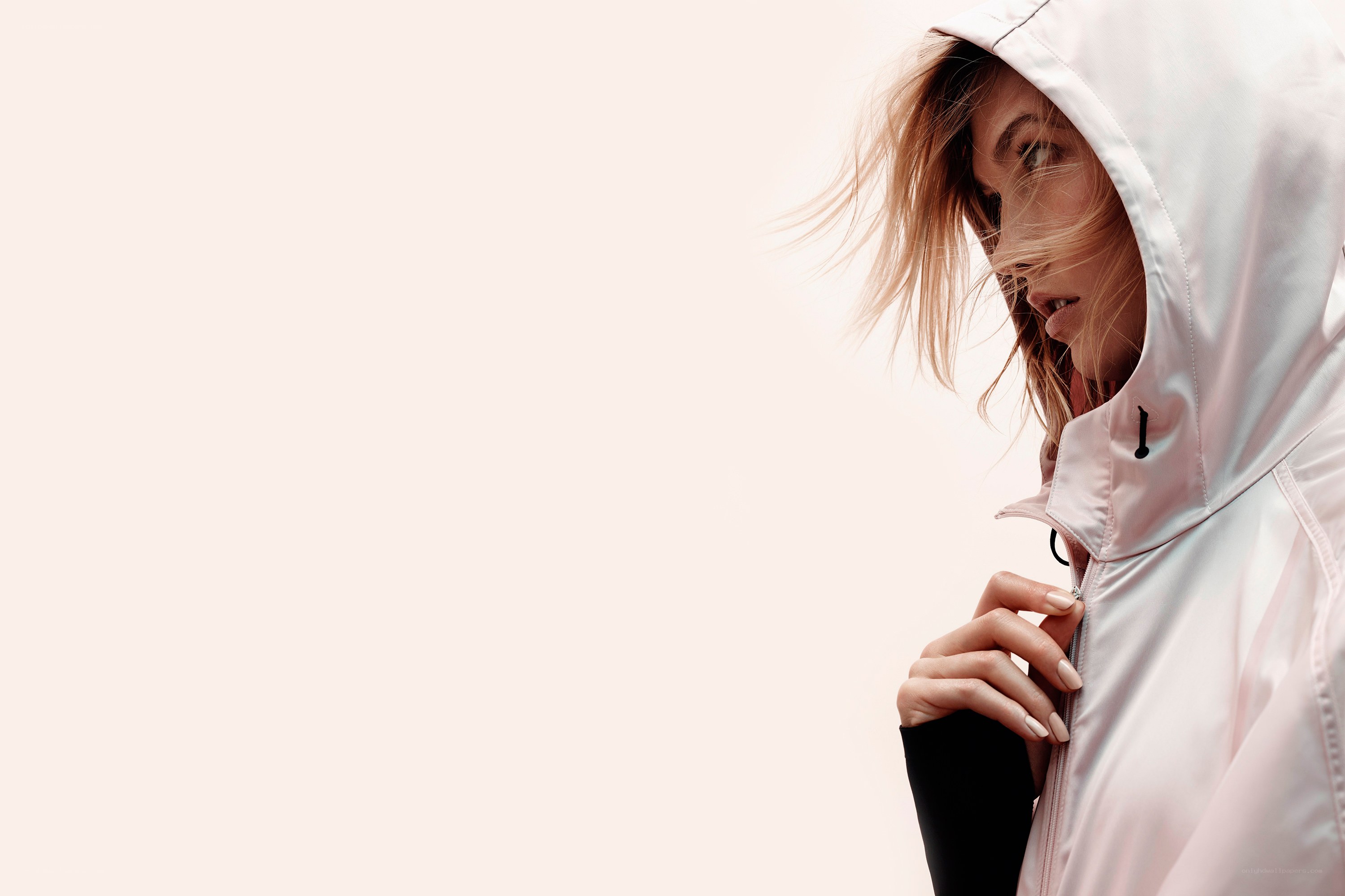 woman in pink hooded jacket