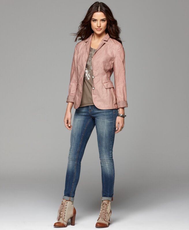 woman in pink jacket and jeans