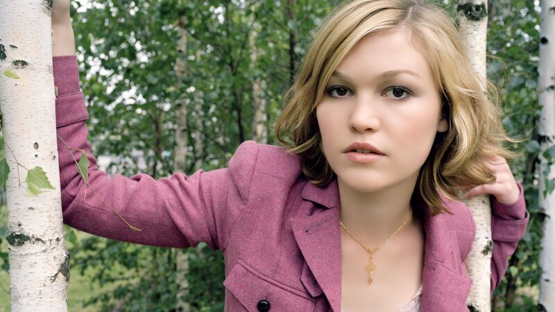 woman in pink jacket outdoors