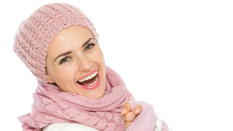 woman in pink knit hat