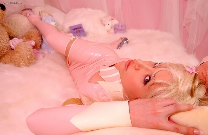 Woman in Pink Latex — Playful, Photograph