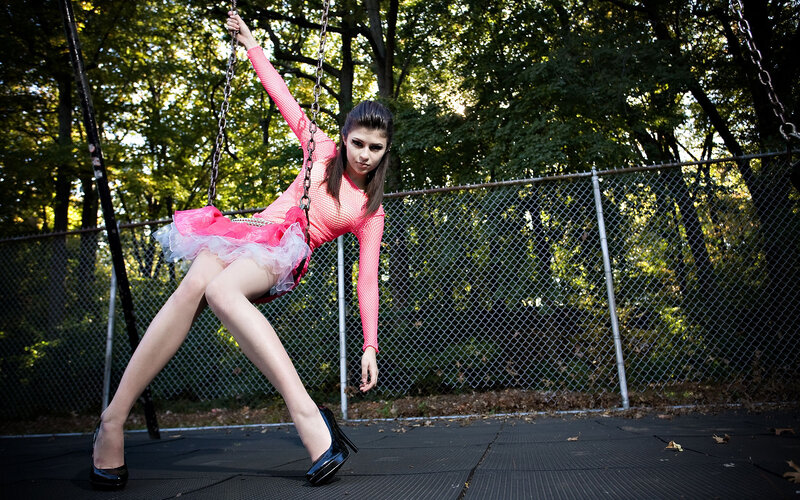 Woman in pink on a swing
