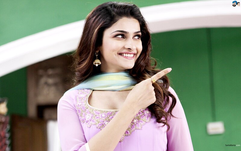woman in pink outfit smiling
