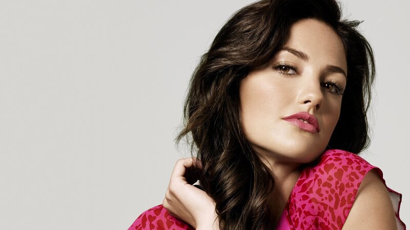 woman in pink patterned top