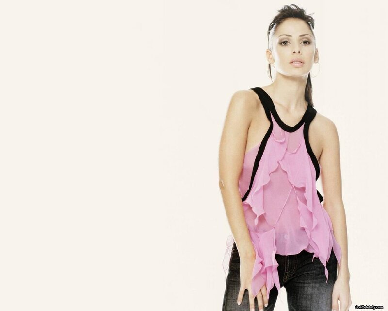 woman in pink ruffled top