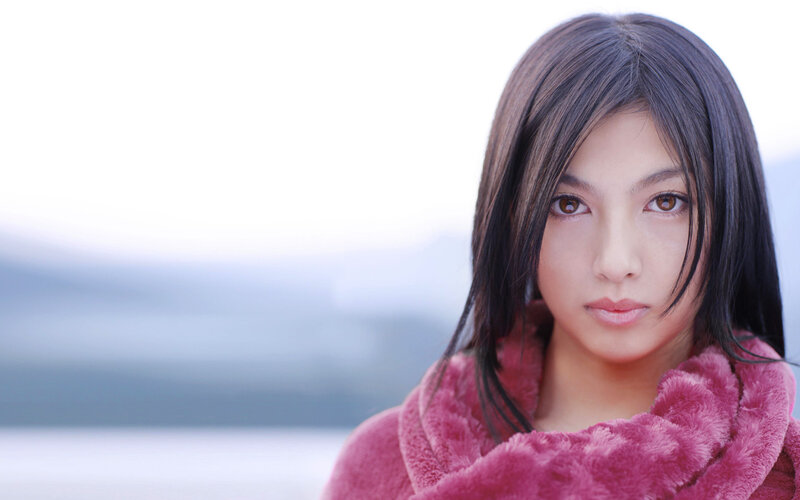 woman in pink scarf