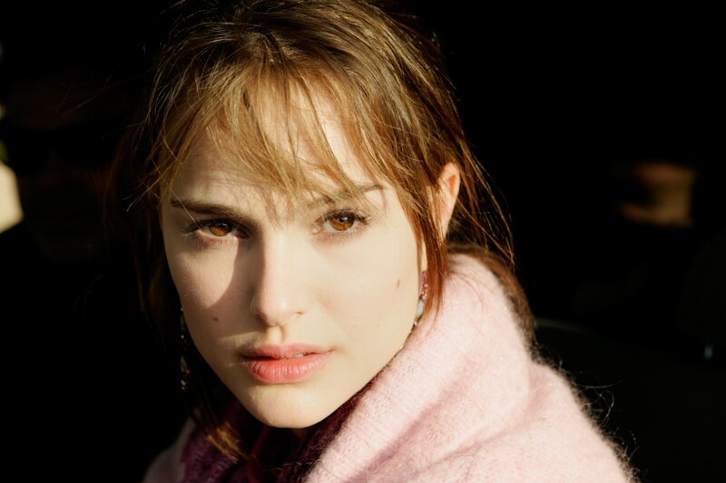 woman in pink scarf