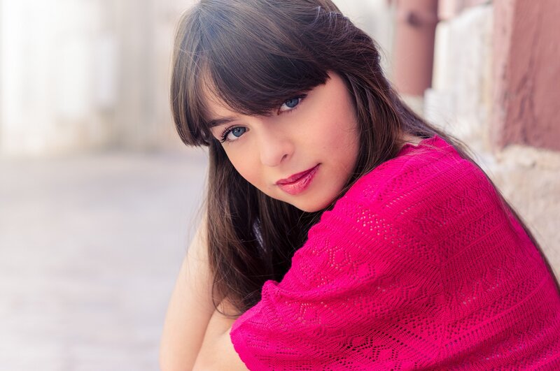 woman in pink shawl