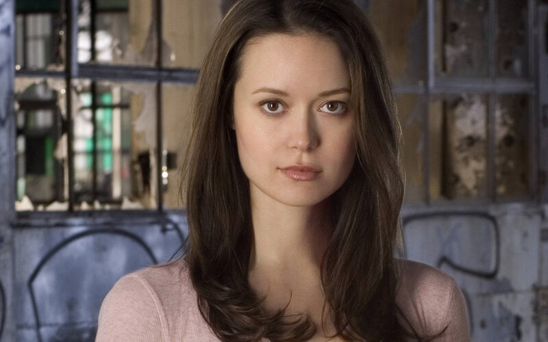 woman in pink shirt