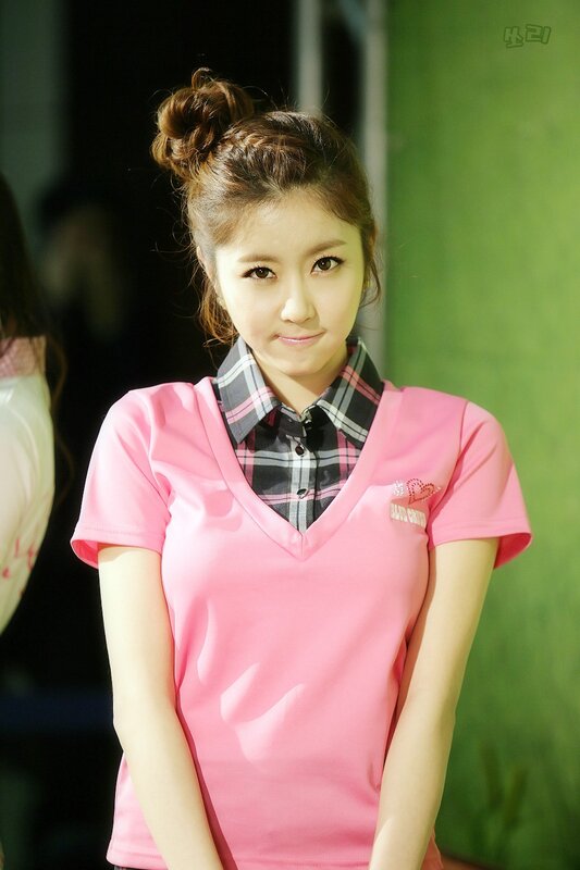 woman in pink shirt