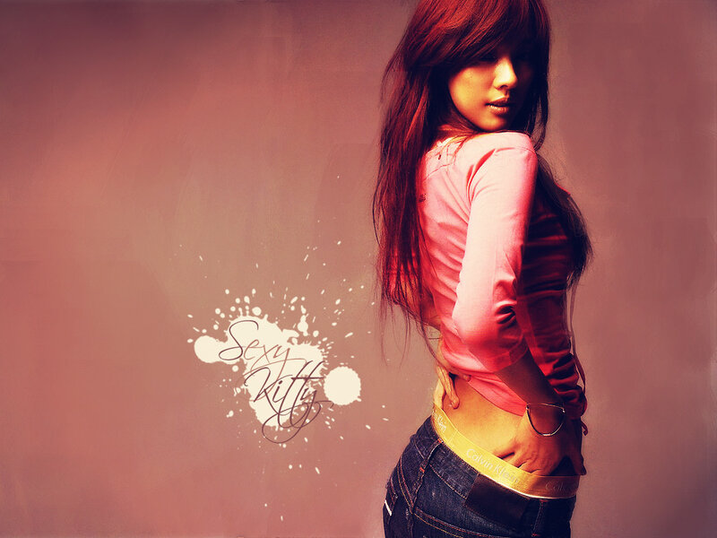 woman in pink shirt and jeans
