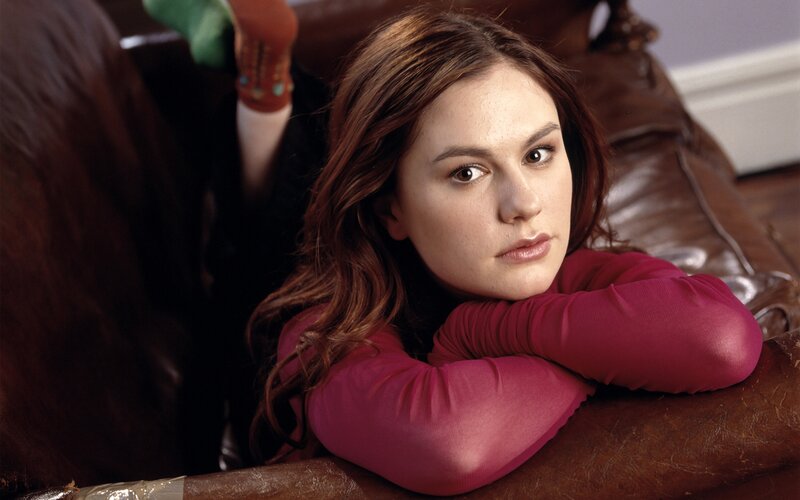 Woman in Pink Shirt — Brown