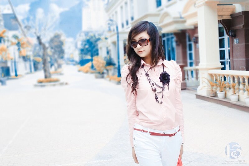 woman in pink shirt on street