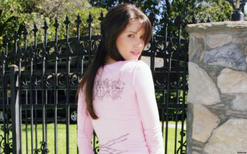 woman in pink shirt outdoors