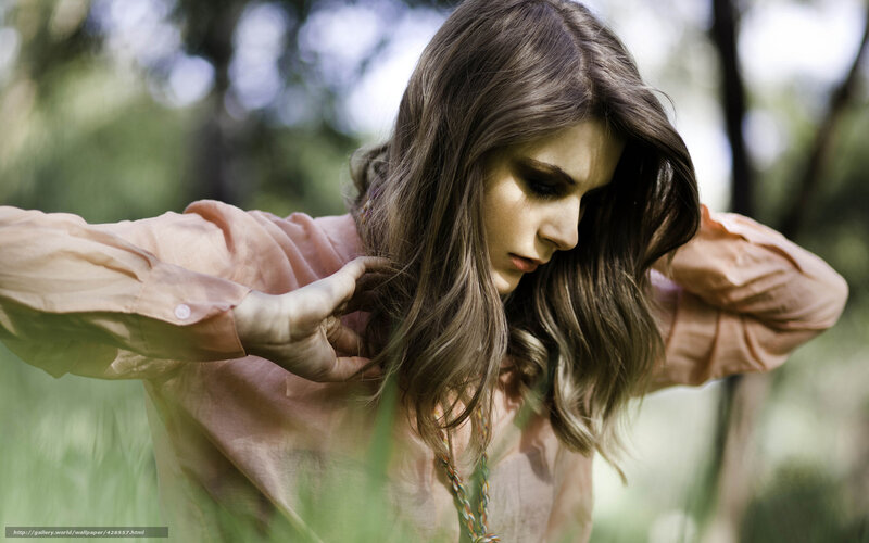 woman in pink shirt outdoors