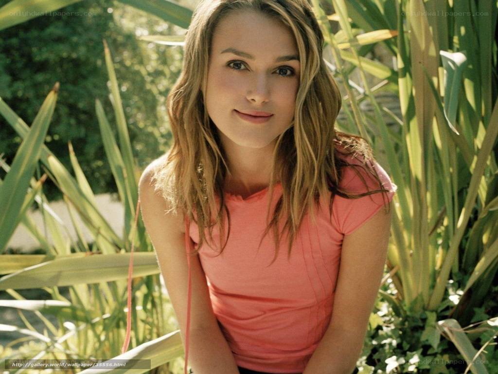 woman in pink shirt outdoors