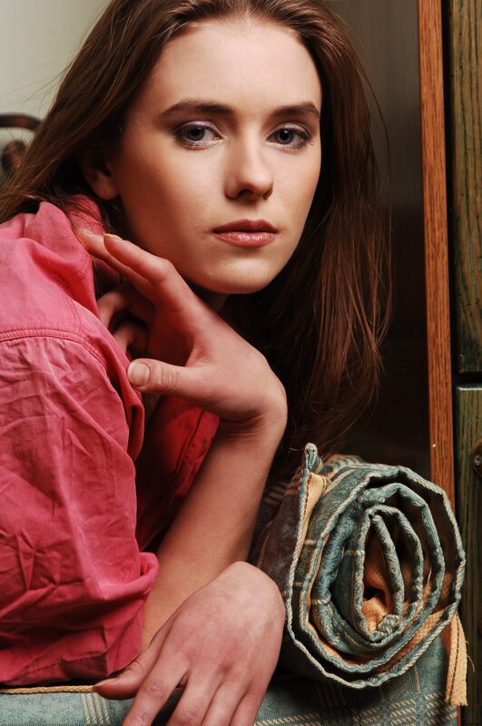 woman in pink shirt posing