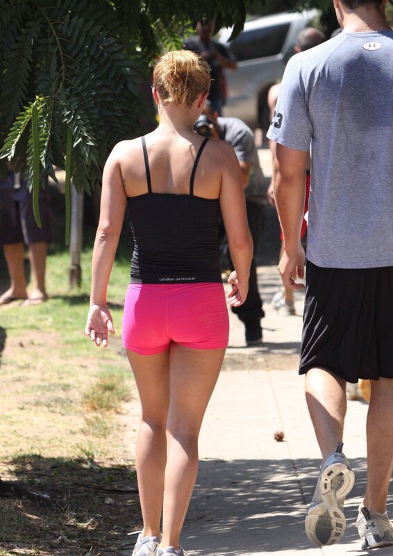 woman in pink shorts walking