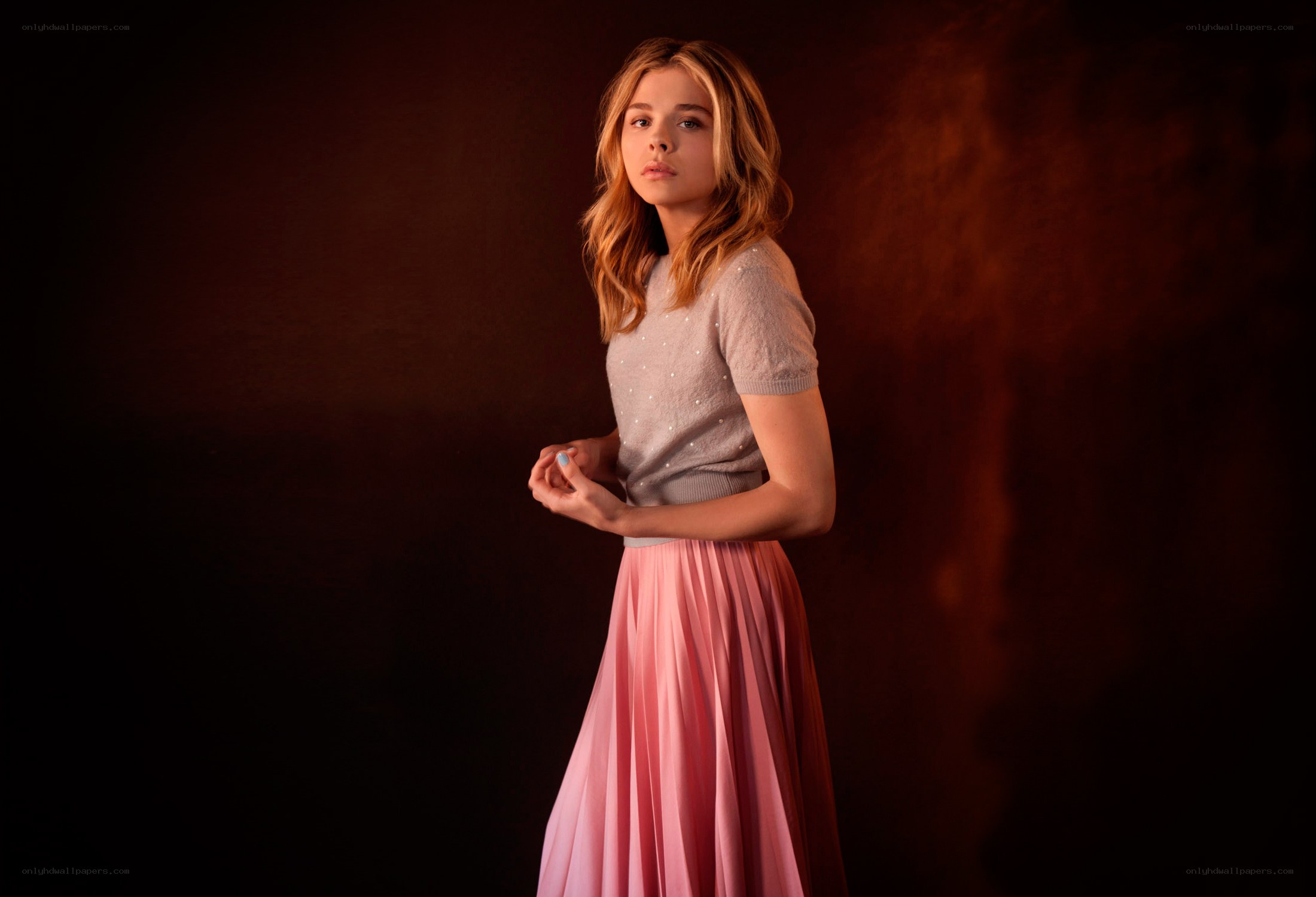 woman in pink skirt