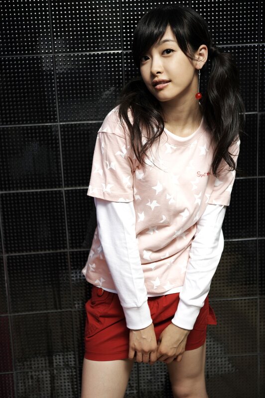 woman in pink star shirt