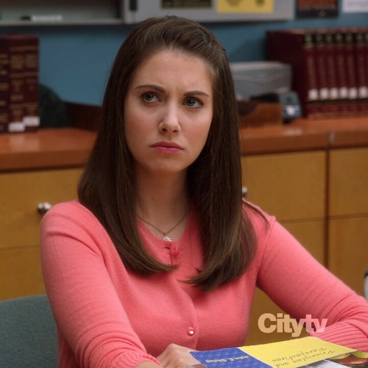 woman in pink sweater