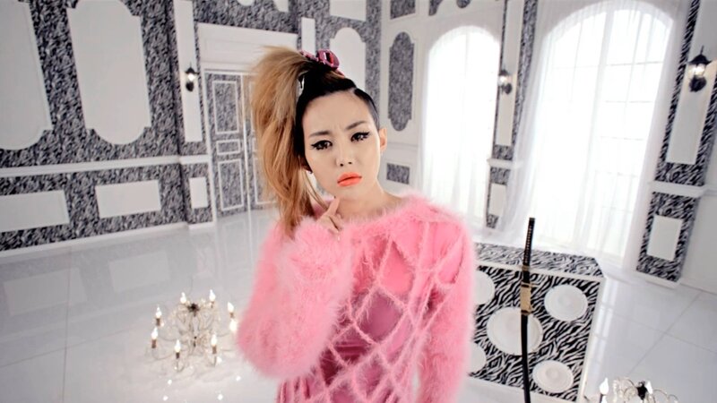 woman in pink sweater