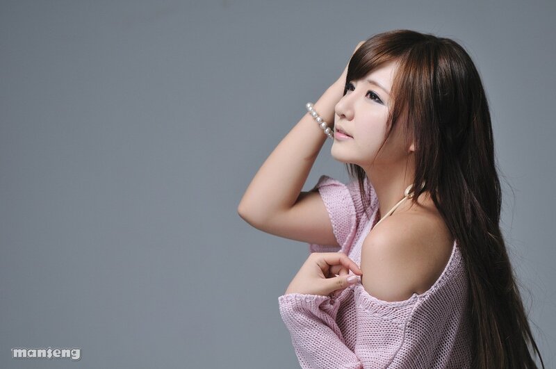 woman in pink sweater